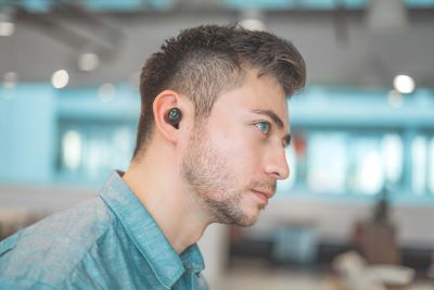 guy listening via earbud